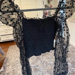 Black top with sheer sleeves